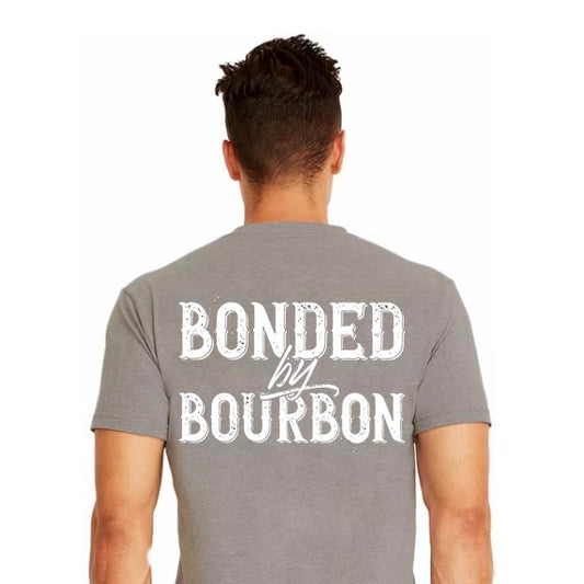 Shows man in grey shirt with the logo on the back that reads, Bonded by Bourbon in white lettering