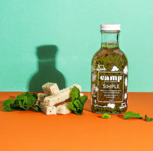 Camp Craft Mint Simple Syrup shown with fresh mint and sugar cubes