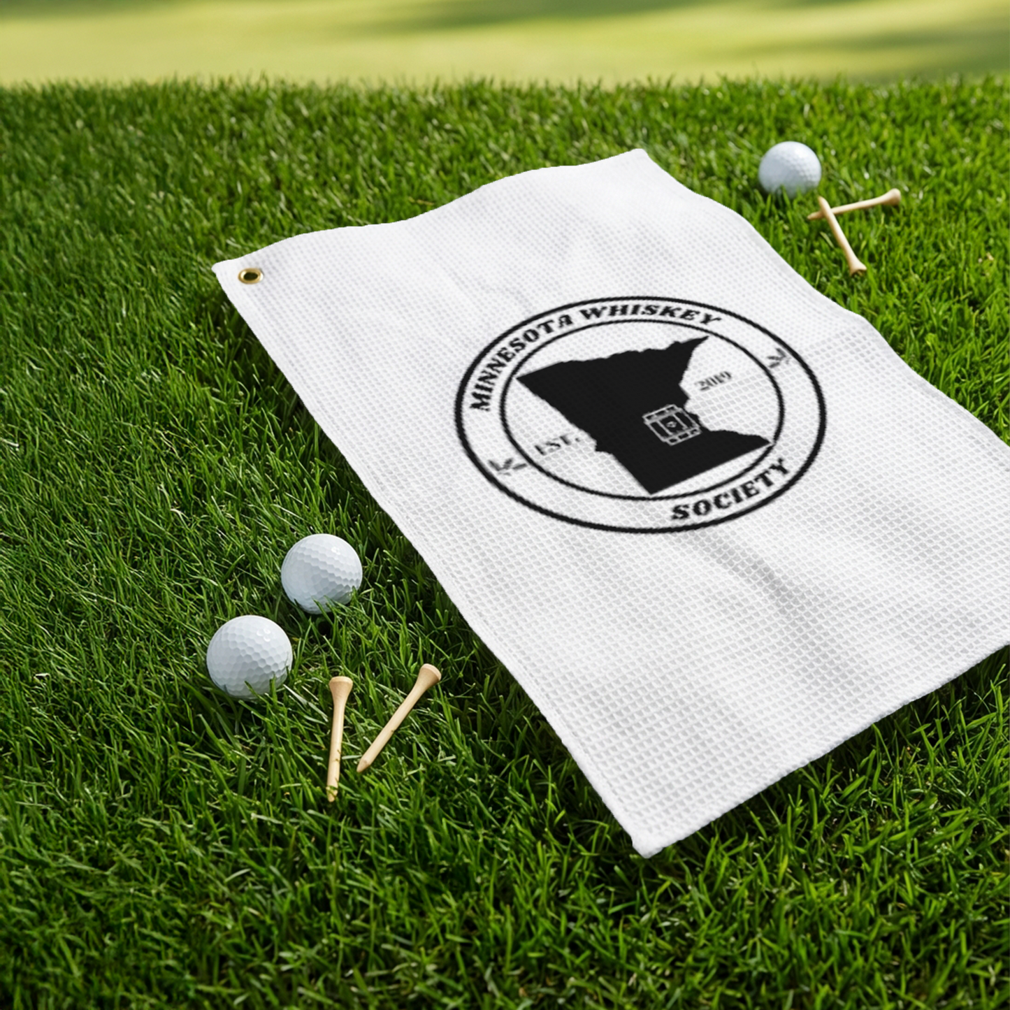 Golf_Towel_Grass_Lifestyle_Mockup.png_15581708